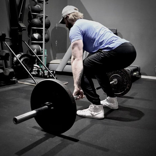 The Science Behind Squats and Deadlifts: How They Build Total-Body Strength
